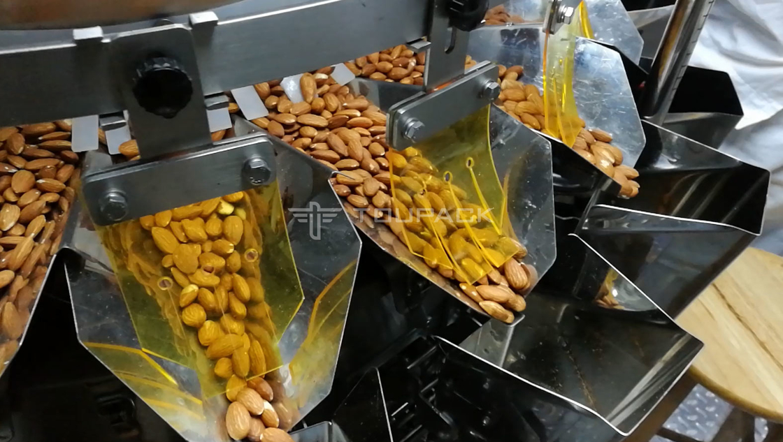 Z Elevator Conveyor Mesin Pengemas Berat Otomatis Penuh Untuk Makanan Ringan Kacang Kismis Kacang Musim