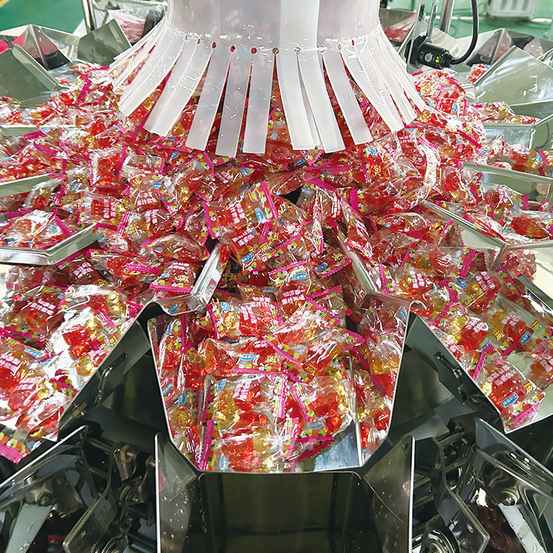 Efisiensi Tinggi Pistachio Nuts Vertikal Packing Machine PLC-Driven Untuk Sealing Wrapping Label Pengisian Kantong Packing Line