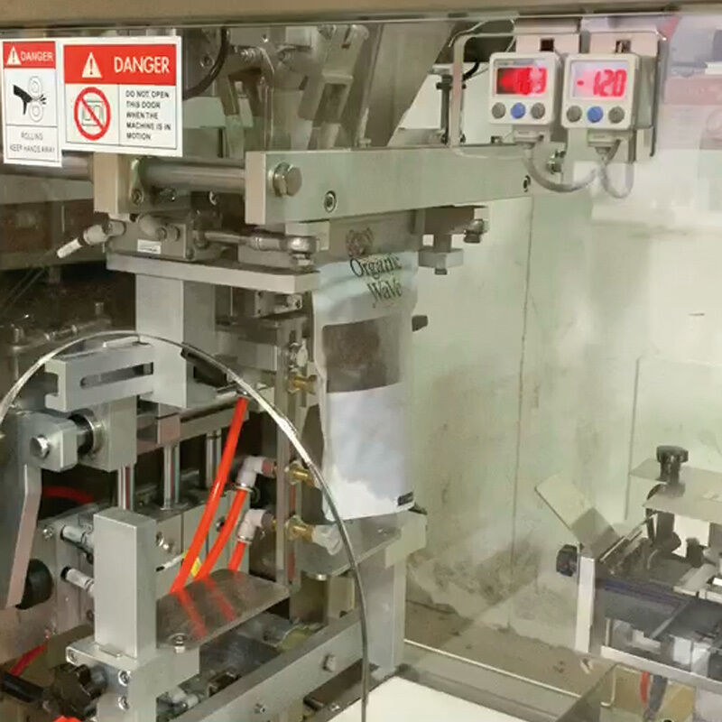 Mesin kemasan vertikal berkapasitas tinggi Snick Sachet Granule Weighing and Filling Machine Mesin pengisian kacang otomatis